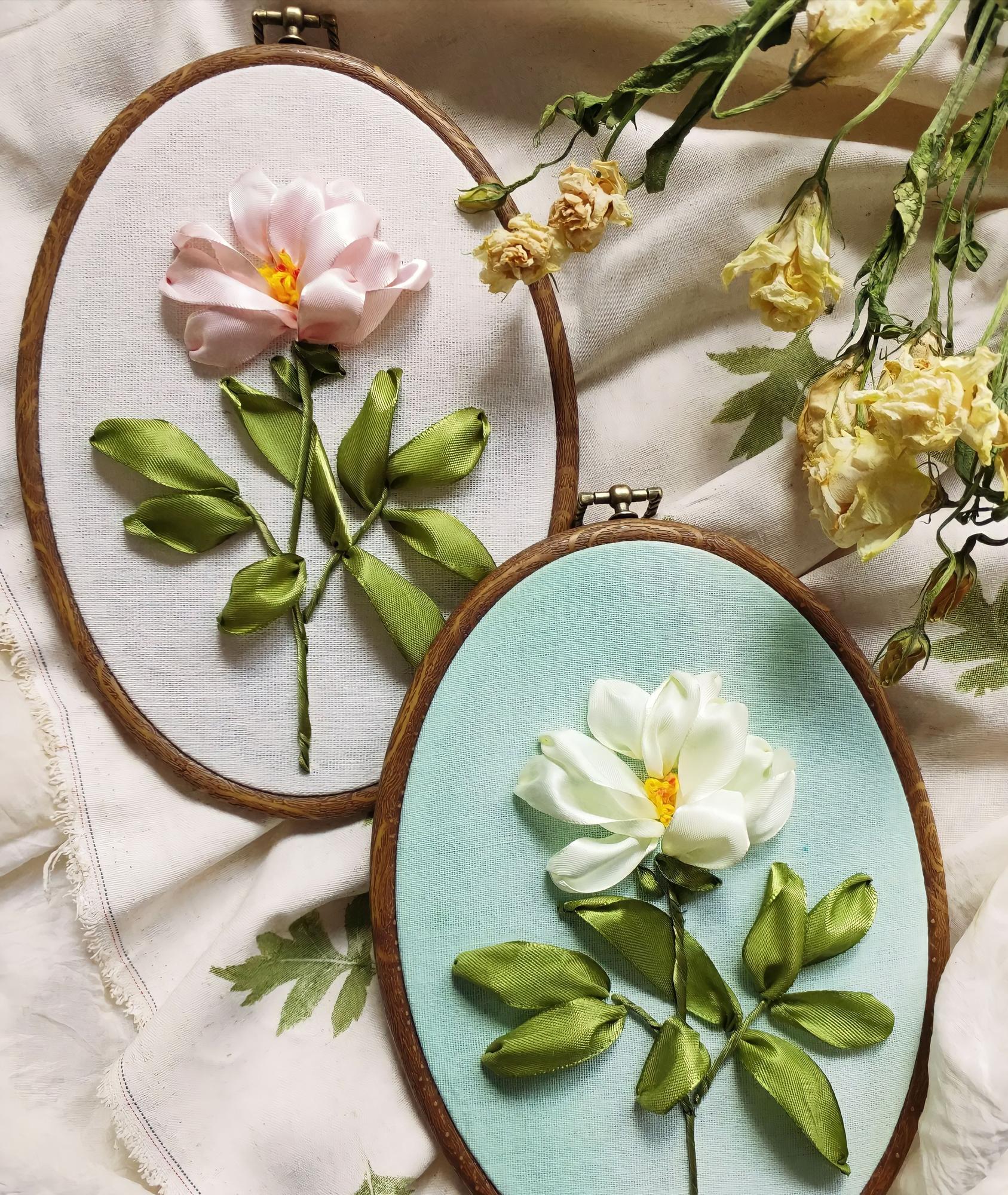 Subtle embroidered floral hoop on linen